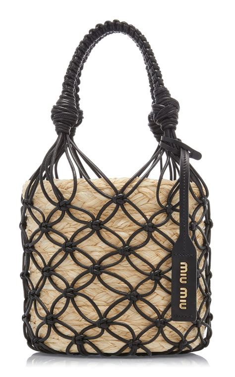 Woven Straw Bucket Bag By Miu Miu .